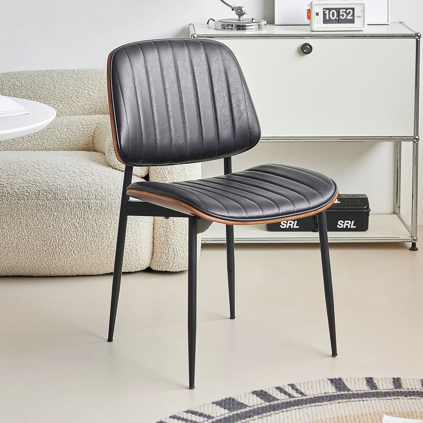 Italienischer minimalistischer Esszimmerstuhl, nordischer Stuhl mit weicher Rückenlehne, Retro-Freizeitstuhl für Zuhause, leichter Luxus, hohes Gefühl 