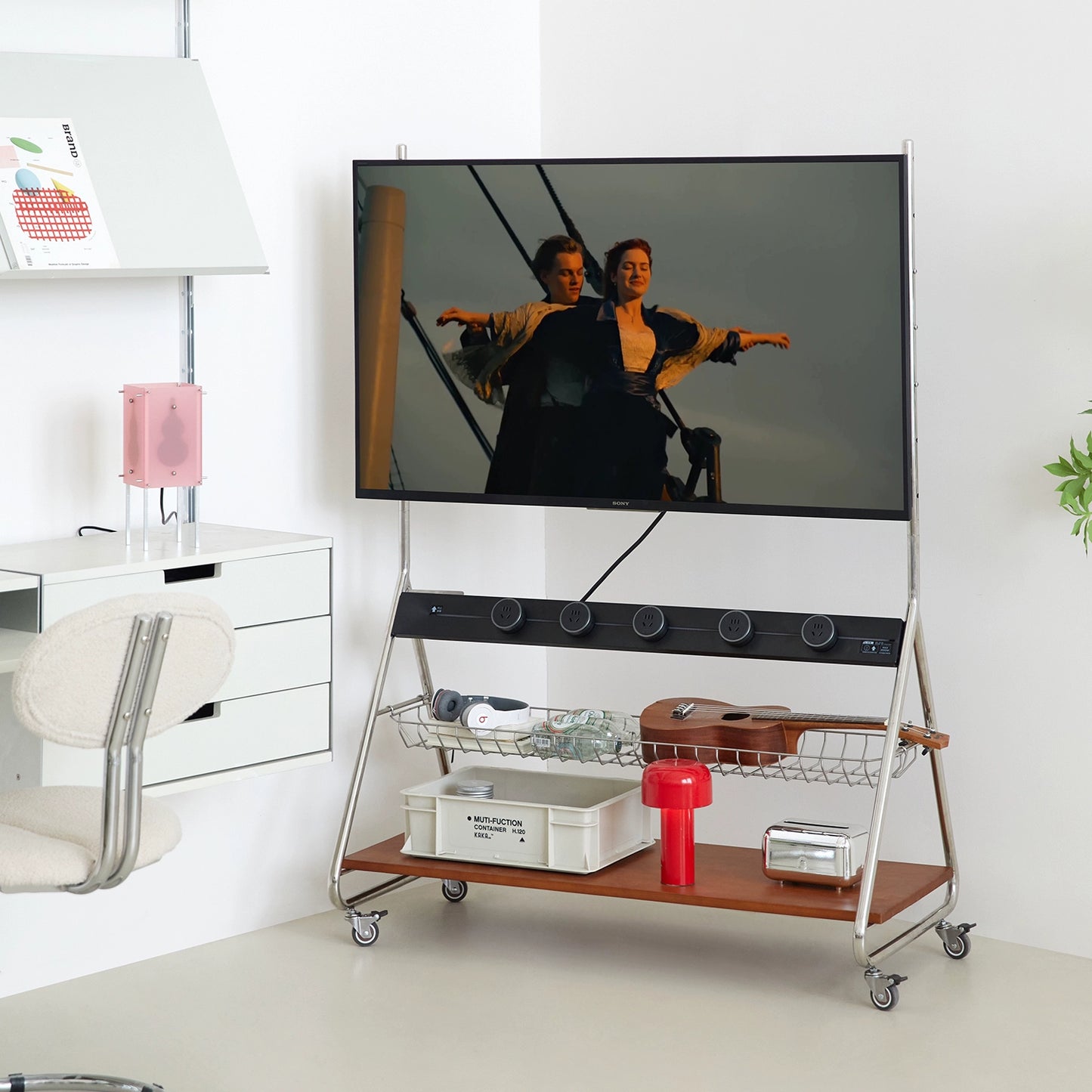 Retro-Designer-TV-Ständer, abnehmbarer nordischer Boden-TV-Ständer, kleine Wohnung mit Strom 